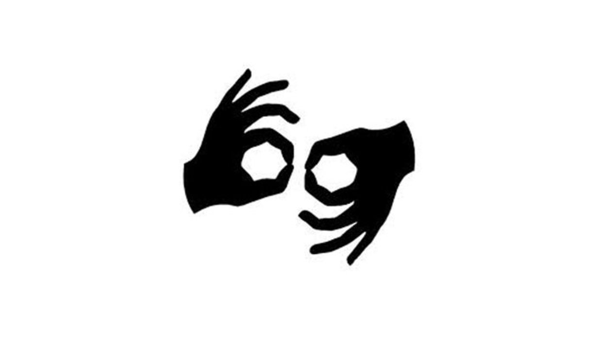 ASL Interpreter Logo of two hands with their index fingers and thumbs pressed together.