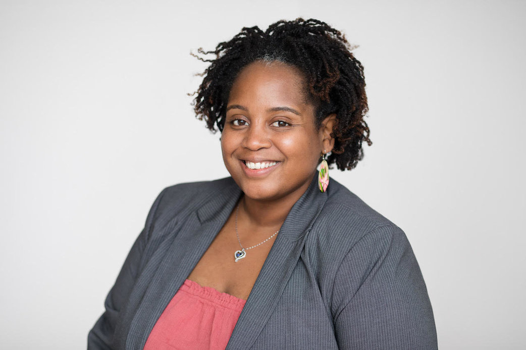 Dr. Yveline Alexis smiling, portrait.