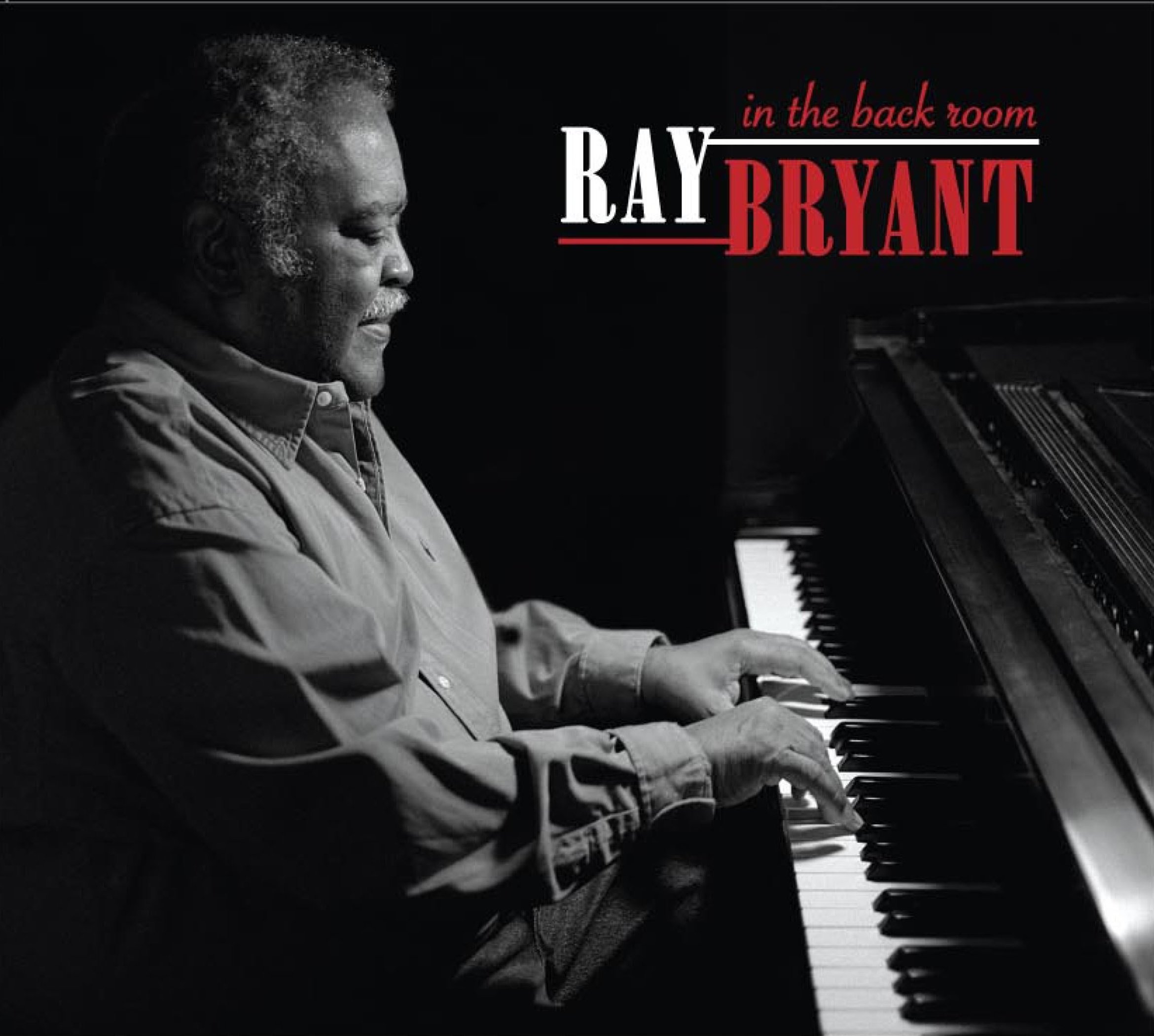 Ray Bryant playing piano, black and white photo, with red and white text reading in the back room: Ray Bryant.
